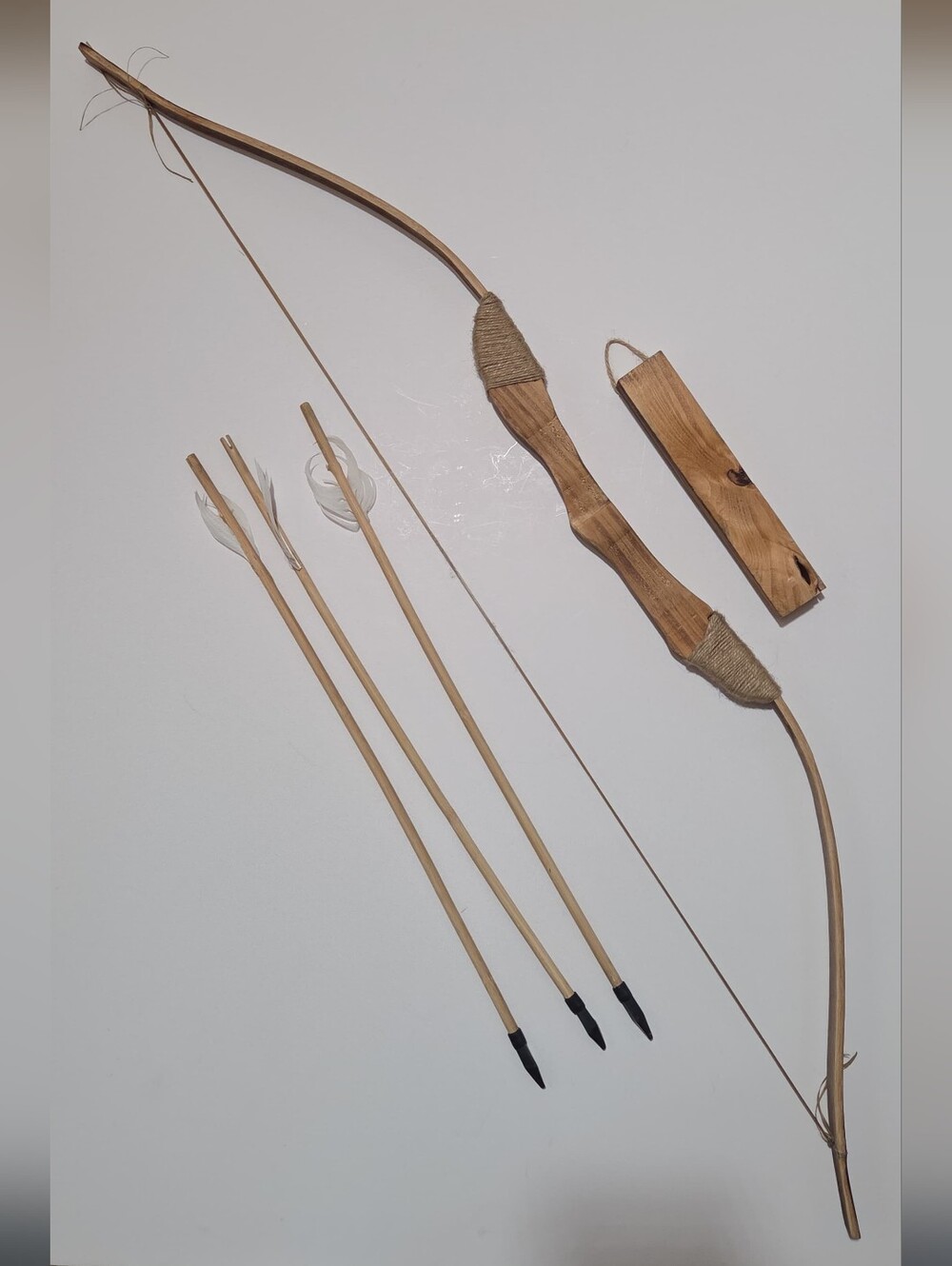 wooden bow with blunt rubber tipped arrows